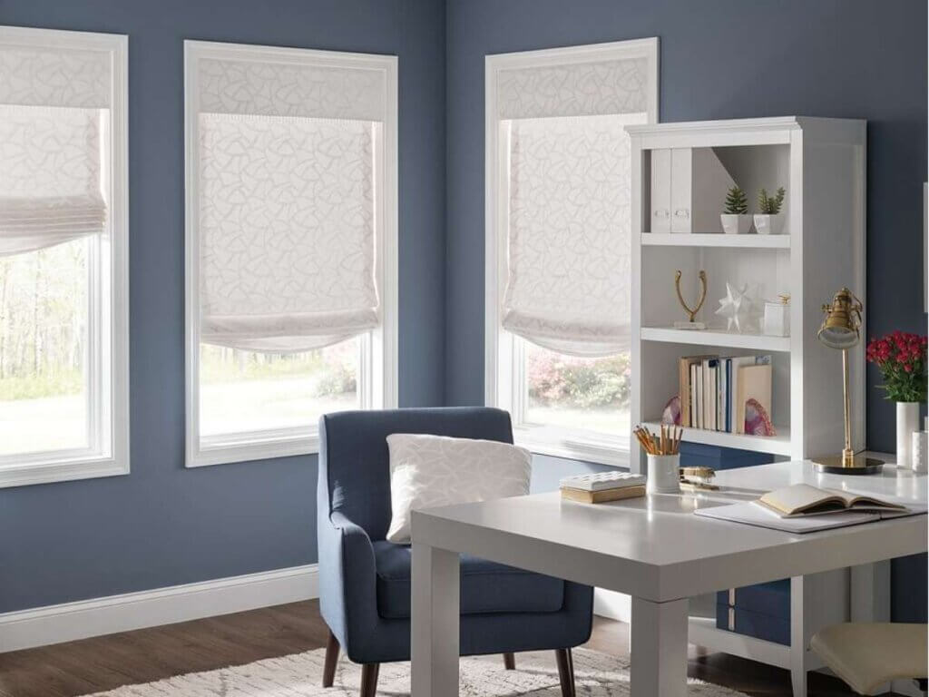 Roman shades combine design and function with thick, structured fabrics.