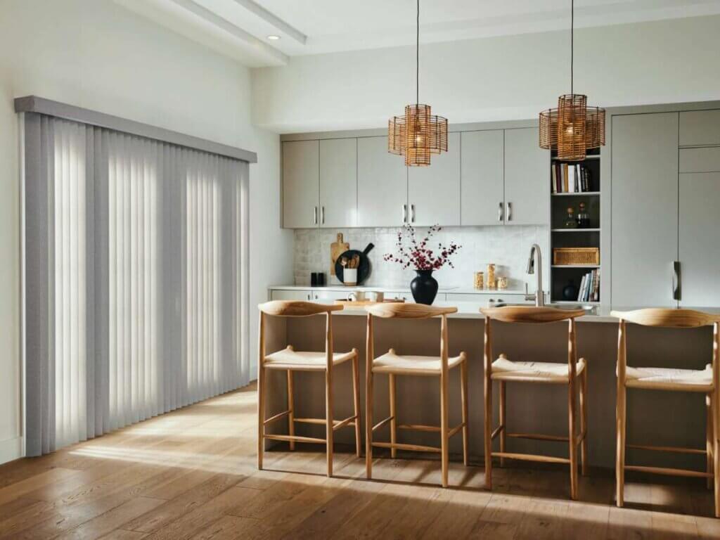 Vertical blinds are designed for wide windows, sliding glass doors, and patio entrances, offering smooth operation and excellent light control.