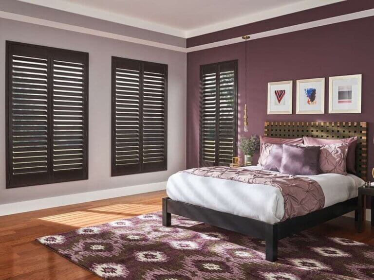 Graber Deep Brown Wood Shutters in Bedroom