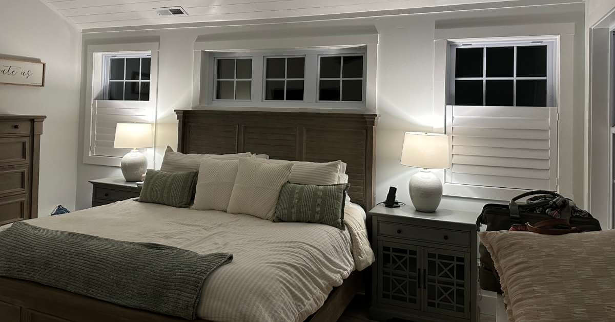 Norman Direct Mount Shutters in Bedside Windows